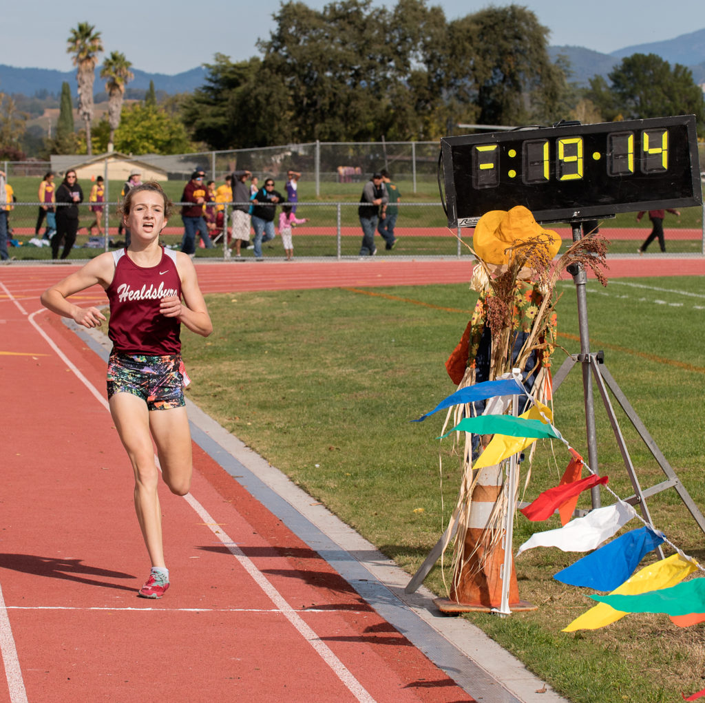 The Winner after pulling away on the Final Hill…….Healdsburg’s Gabby Peterson finishing in 19:13
