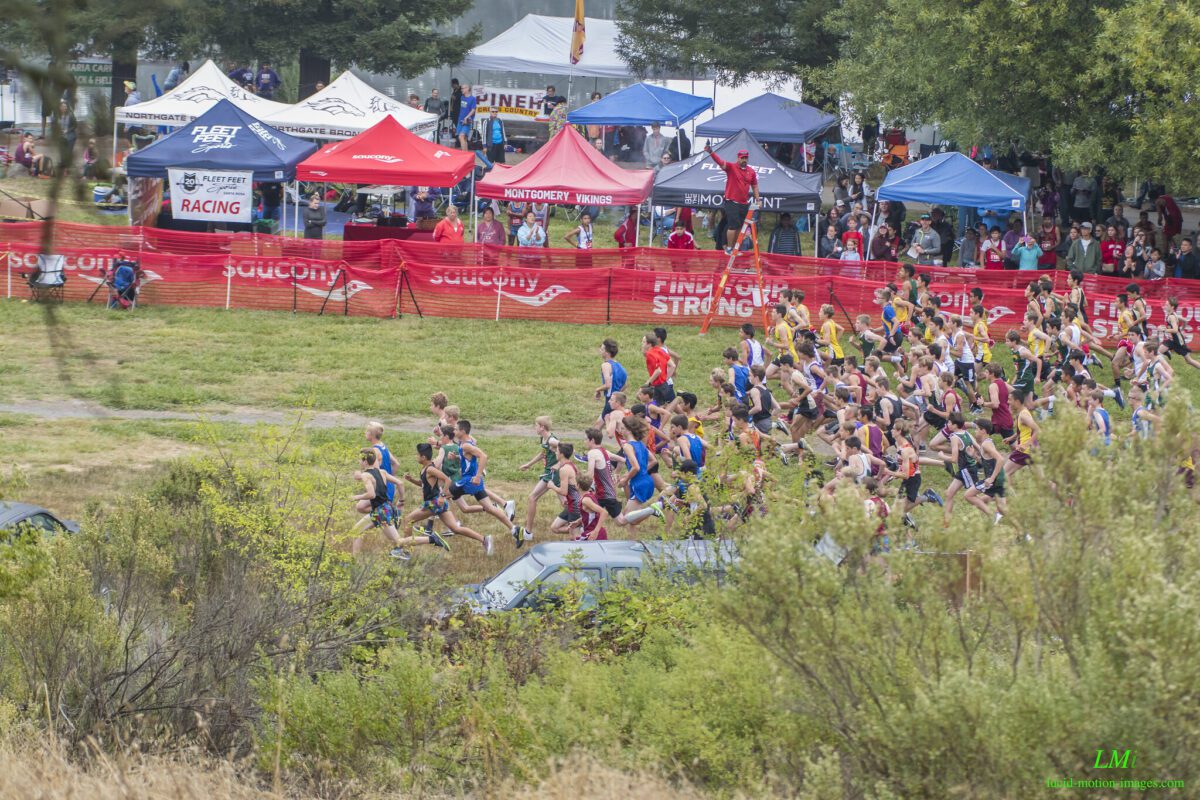 Large cross country race with tents, spectators
