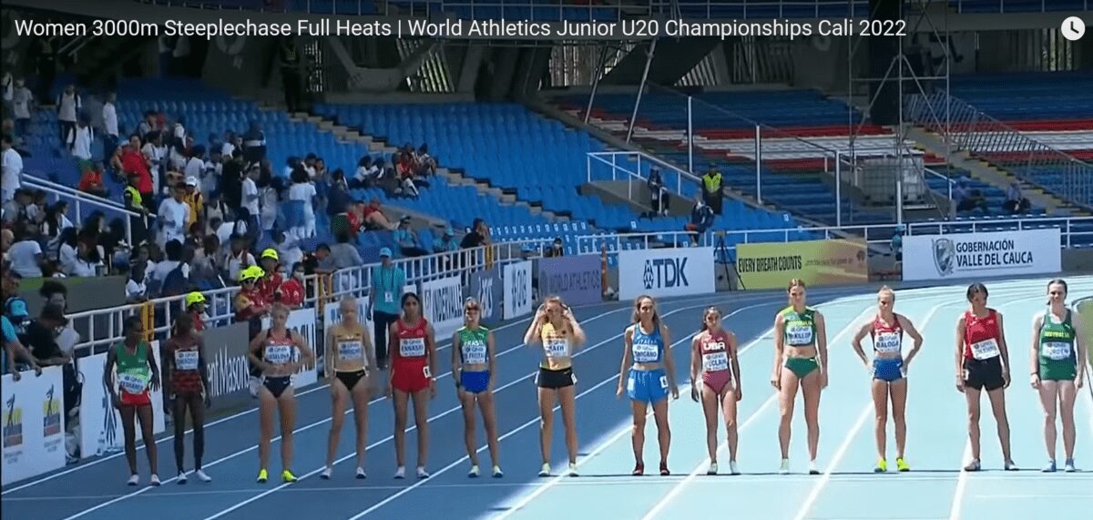Women runners lined up on steeplechase track