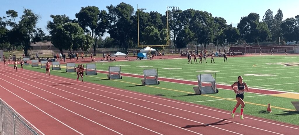 Athlete sprinting on outdoor track