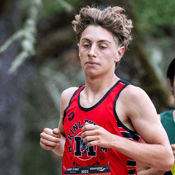 Young runner wearing red singlet