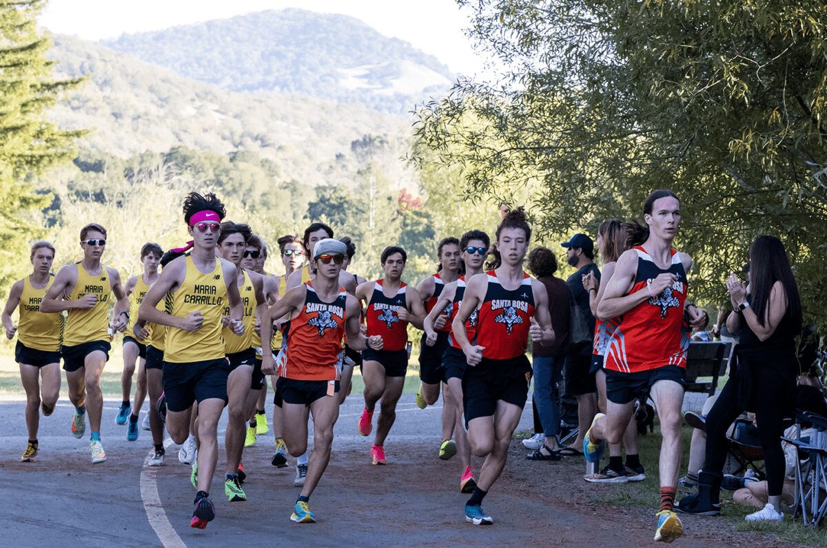 High school cross country runners racing