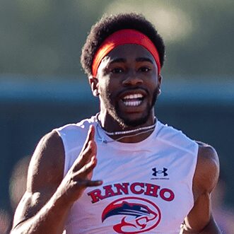 Runner with red headband, Rancho jersey