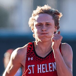 Close-up runner in red St Helen uniform