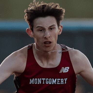 Runner in Montgomery red singlet racing