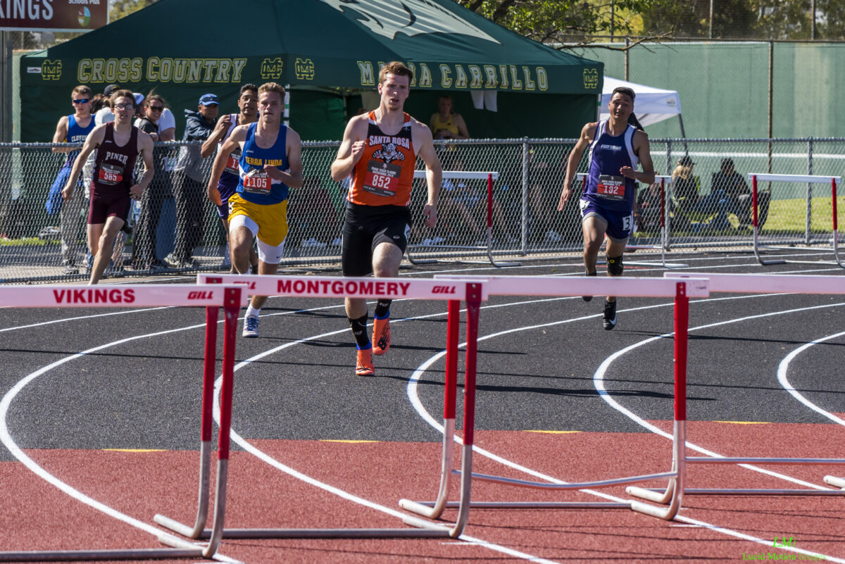 High school hurdlers sprinting toward finish line