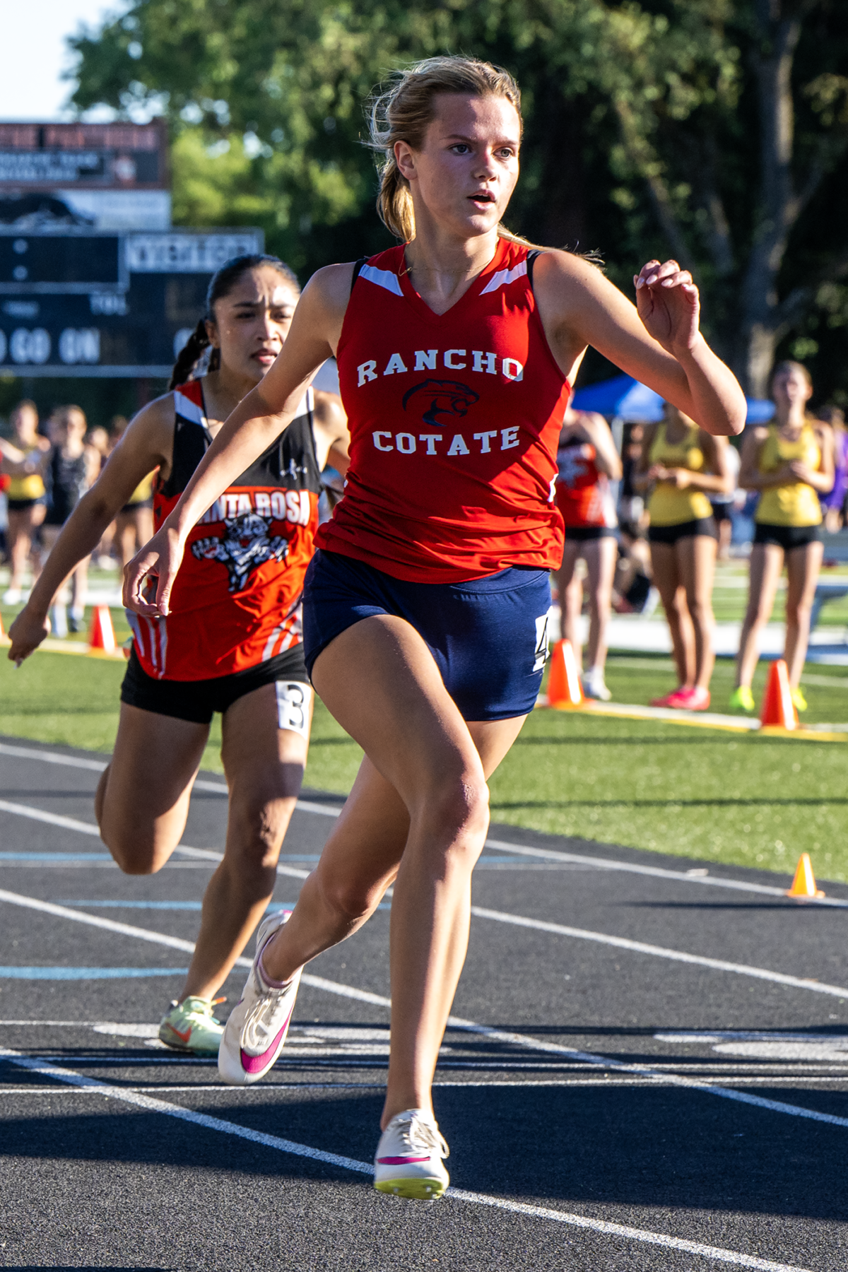 Sprinter in red Rancho Cotate uniform