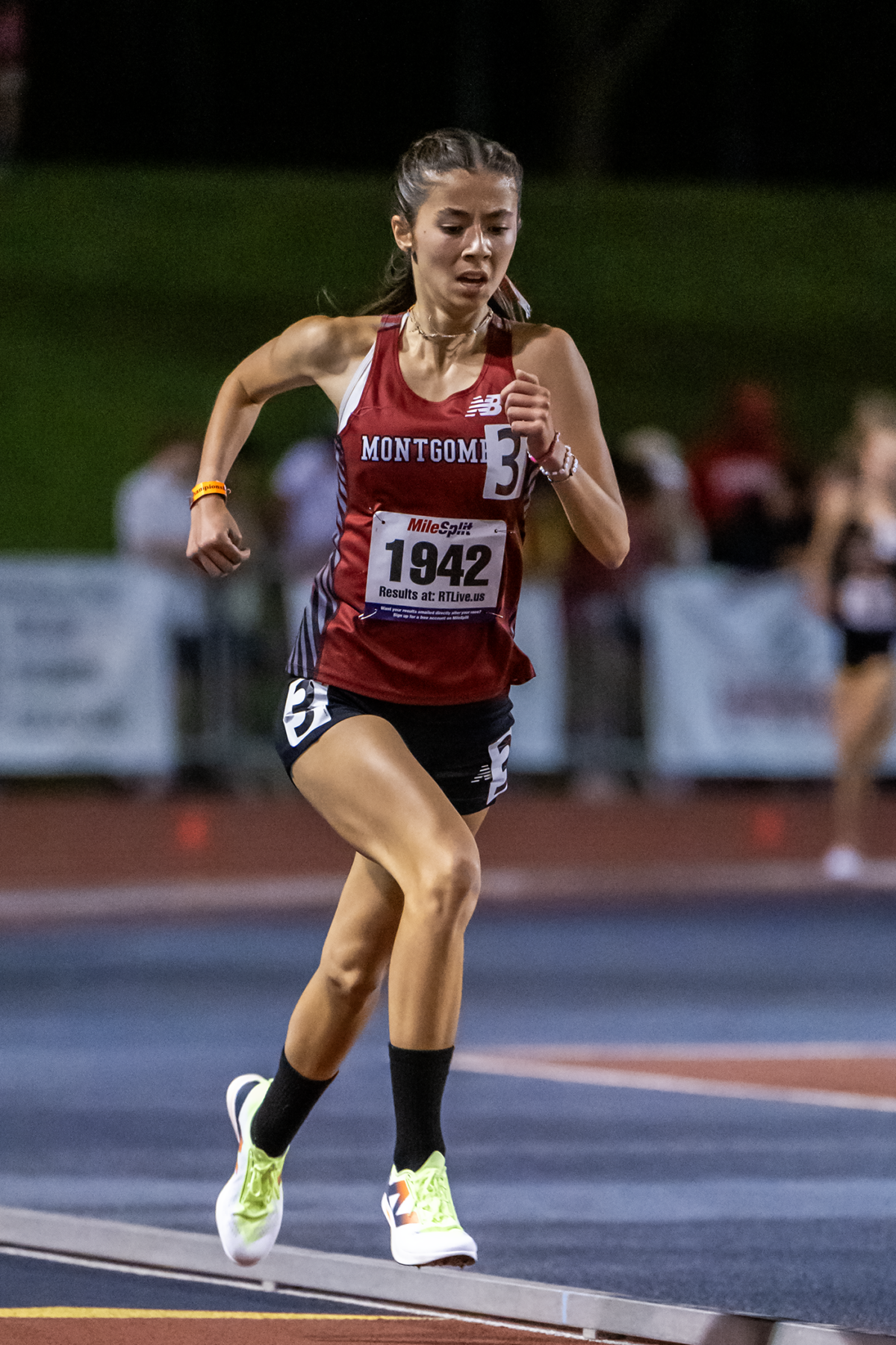 Track athlete in Montgomery uniform sprinting