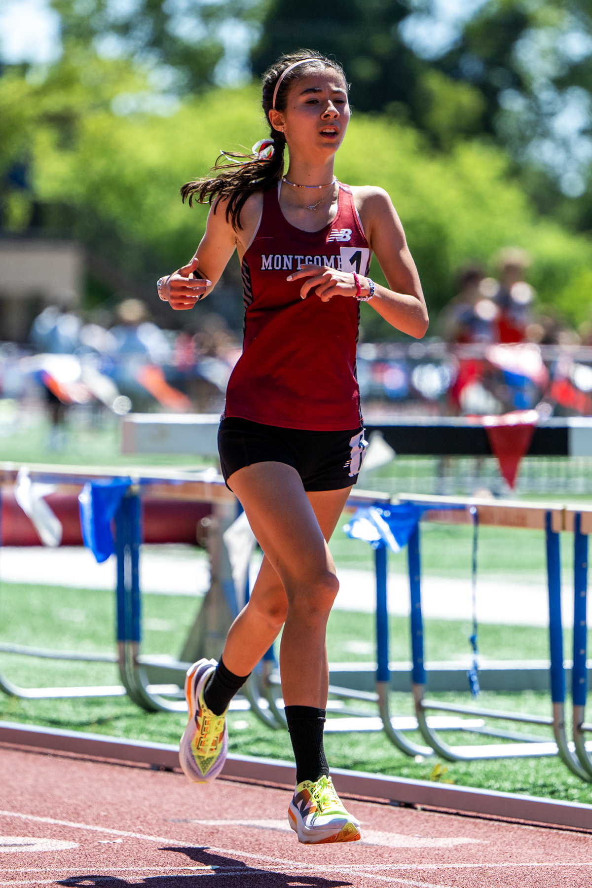 Female track athlete in red Montgomery uniform