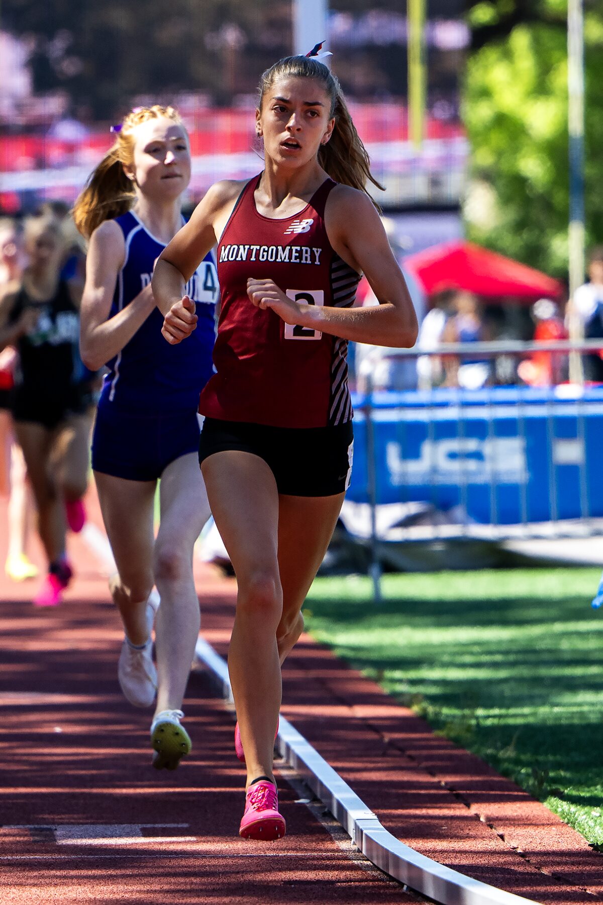 Female track athlete in Montgomery uniform