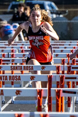 Female hurdler in Santa Rosa uniform