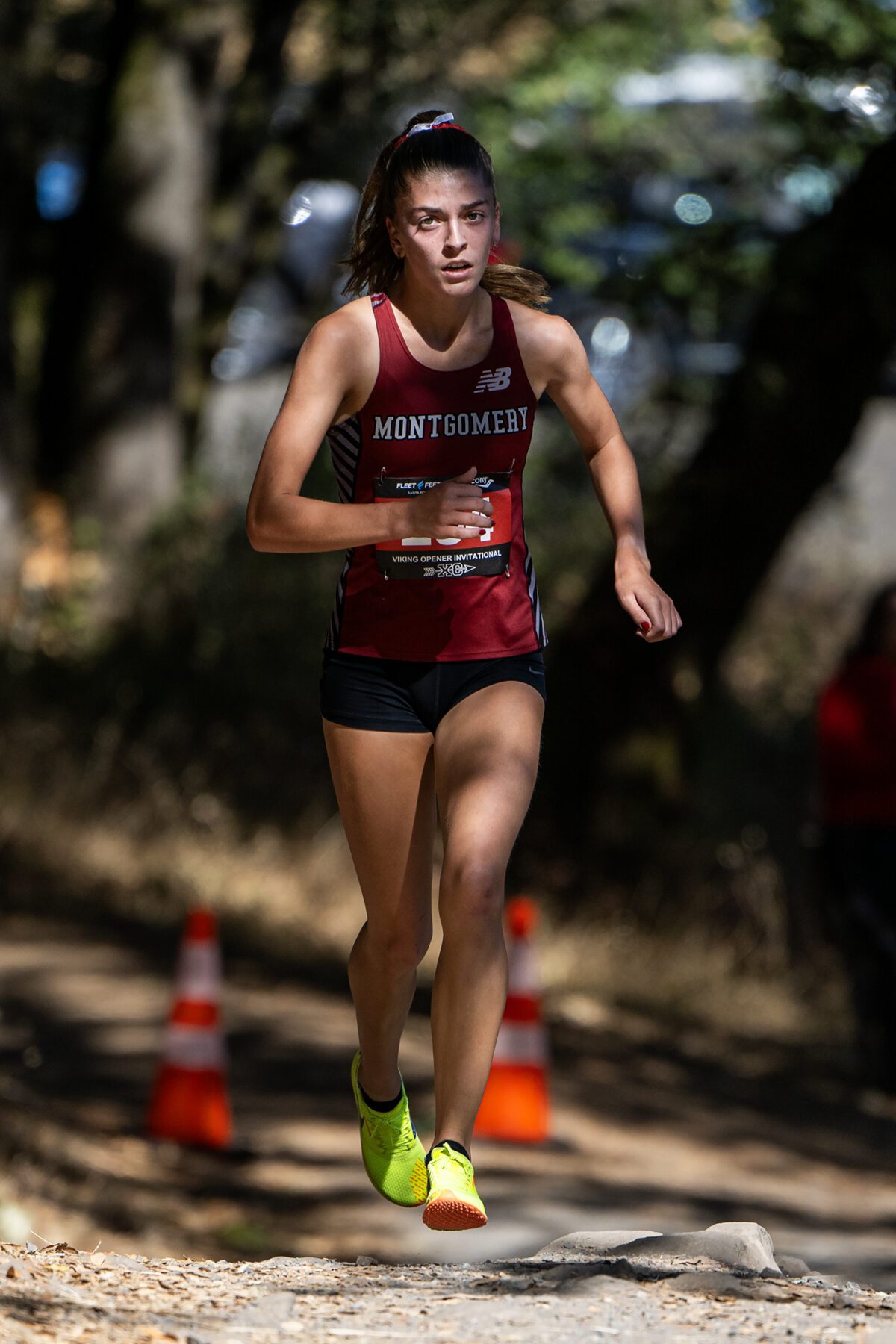 Cross-country runner in red uniform
