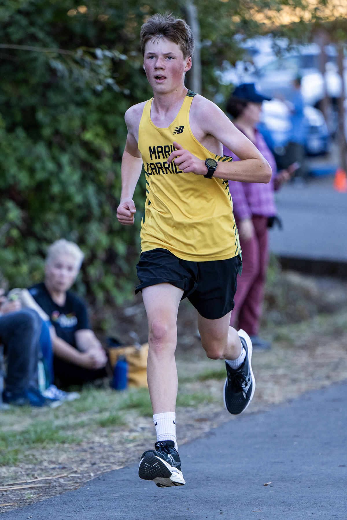 Cross-country runner in yellow singlet