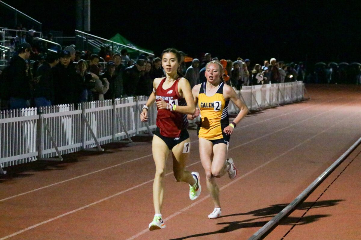 Nighttime duel: two female track runners