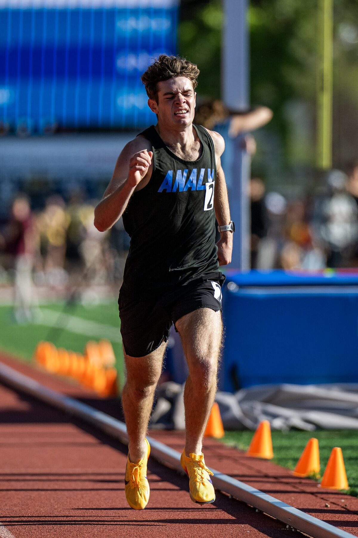Athlete sprinting on outdoor track
