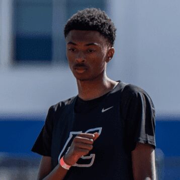 Person wearing black Nike athletic shirt